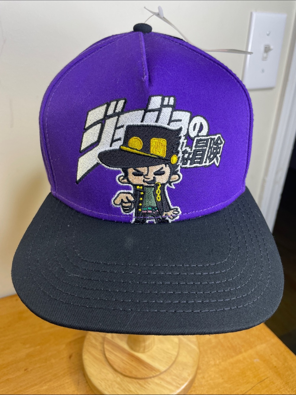 JoJo's Purple and Black Embroidered Character Snapback Hat